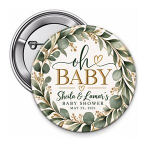 Denim baby shower button with blue denim overalls, baby sneakers, silver rhinestones, crowns, and A Little Gem Is on the Way wording.