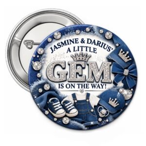 Brown and gold luxury baby shower button with gold ribbons, baby shoes, crown, and custom baby shower wording.
