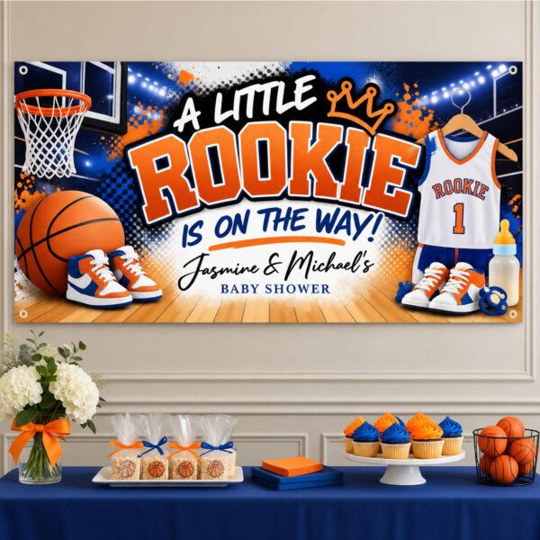 Personalized basketball baby shower banner with A Little Rookie Is on the Way lettering, baby basketball sneakers and blue orange graphics