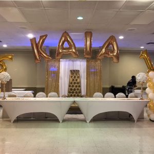 Sweet 26 balloon column and name arch