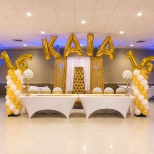 sweet 16 balloon columns and name arch