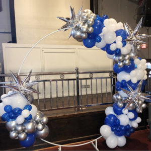 the Brat Shack Party Store galaxy balloon arch on ring