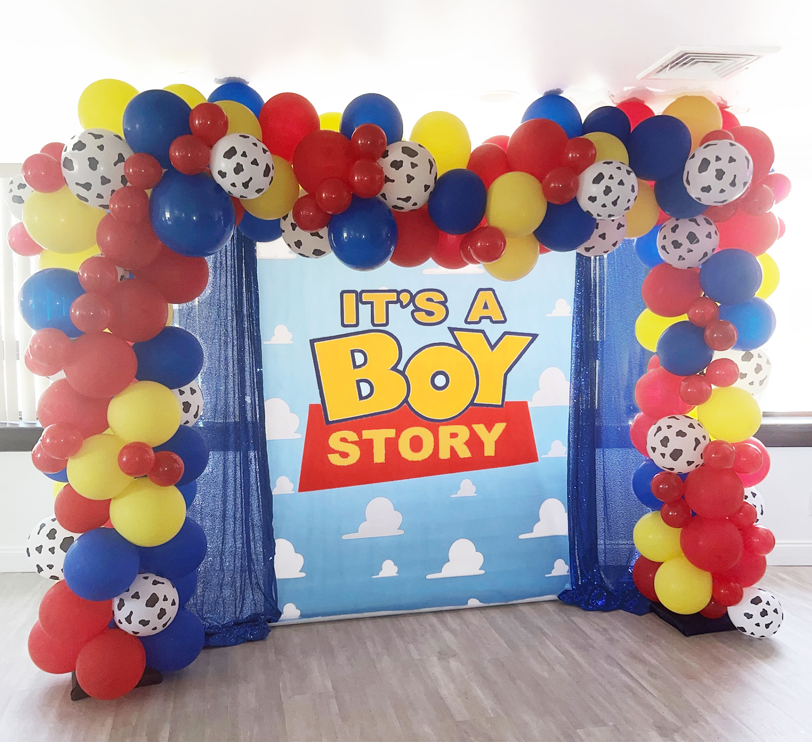 the brat shack boy story balloon arch