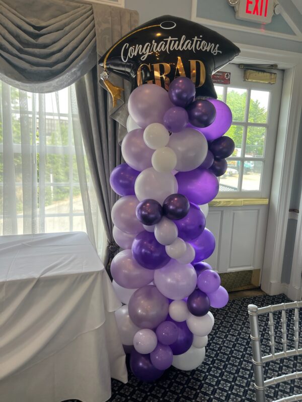 The Brat Shack Organic Graduation balloon column