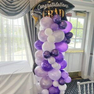 The Brat Shack Organic Graduation balloon column