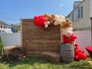 Western Cowboy Party Backdrop with Organic Balloon Garland & Rustic Décor