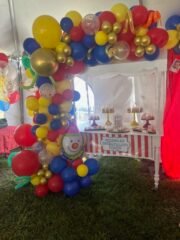 Carnival Theme Balloon arch & cart with treats