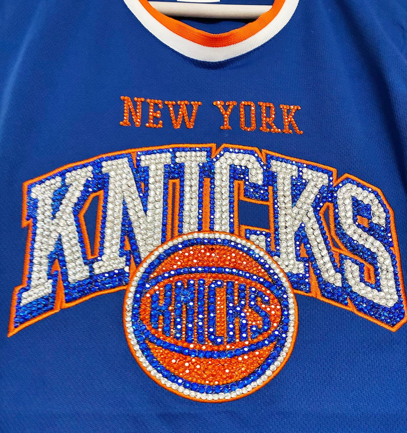 blinged out orange basketball jersey