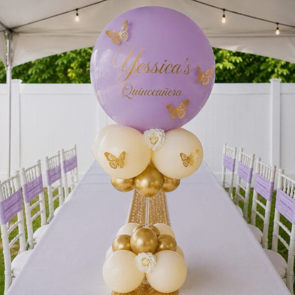 elegant Quince butterfly balloon centerpiece the brat shack