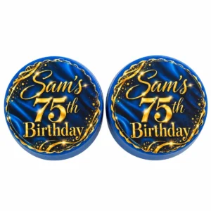 Two royal blue chocolate covered Oreos with personalized Sam's 75th Birthday edible images and gold lettering