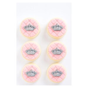 Pink princess chocolate covered Oreos featuring quilted blush pink decorations and ornate silver crowns