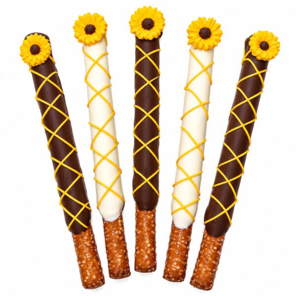 Sunflower chocolate covered pretzel rods decorated with yellow drizzle and sunflower toppers